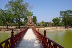 A bridge leading to a little island containing... more temples!