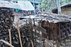 Khamu village wood pile